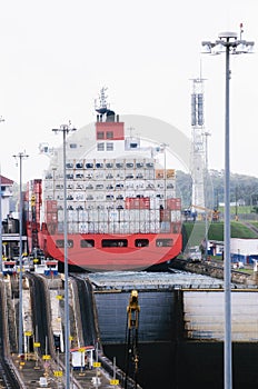 Cargo ship transiting the Miraflores locks in the Panama Canal