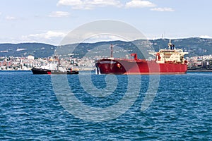 Cargo ship and tug boat