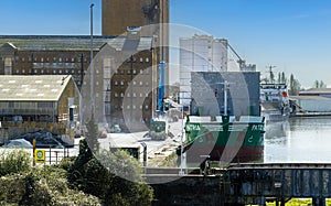 Cargo ship unloading at Sharpness Docks in Gloucestershire, UK
