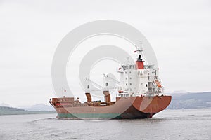 Cargo ship vessel freight containers carrier transport on sea ocean to port dock