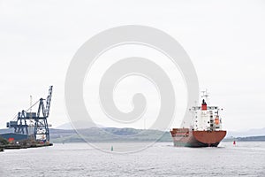 Cargo ship vessel freight containers carrier transport on sea ocean to port dock