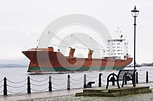 Cargo ship vessel freight containers carrier transport on sea ocean to port dock