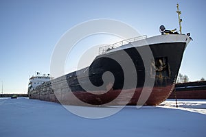 Cargo ship in the winter parking