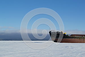 Cargo ship in the winter parking