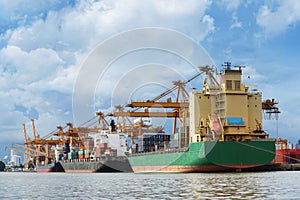 Cargo ships are berthing at Bangkok port to take cargo operation as in shipping, logistics business