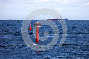 Cargo ships and buoy
