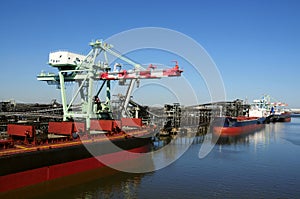 Cargo ships at oil refinery