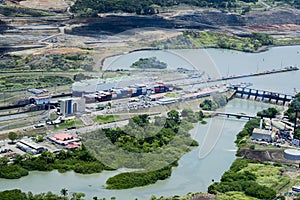 Cargo ships passing through Miraflores Locks at Panama Canal.