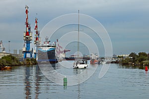 cargo ships stand under loading in the port of Haifa Israel