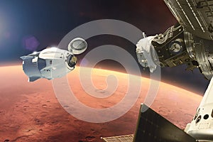 Cargo spacecraft in low-Mars orbit. Elements of this image furnished by NASA