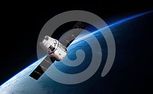 Cargo spaceship in the space and earth on the background