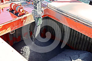 Cargo terminal for loading coal cargos by shore cranes. Port Gladstone, Australia. December, 2019. photo