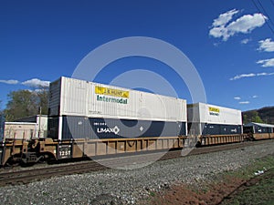 Cargo train of inter modal containers of JB Hunt and Umax in West Haverstraw, NY.