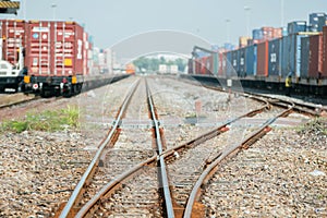 Cargo train platform with freight train container at depot