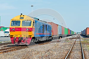 Cargo train platform with freight train container at depot