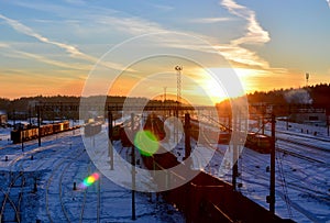 Cargo train platform at sunset with container