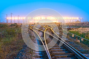 Cargo train platform at sunset with container