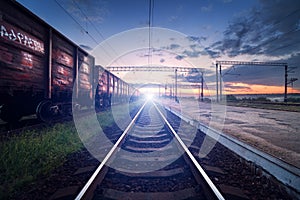 Cargo train platform at sunset. Railroad in Ukraine. Railway