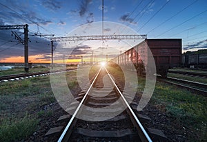 Cargo train platform at sunset. Railroad in Ukraine. Railway