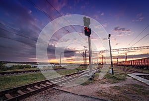 Cargo train platform at sunset. Railroad in Ukraine. Railway