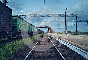 Cargo train platform at sunset. Railroad in Ukraine. Railway