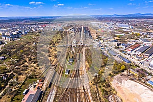 Cargo trains. Aerial view of colorful freight trains on the railway station. Wagons with goods on railroad.Aerial view