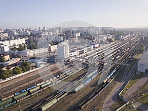 Cargo trains. Aerial view from drone freight wagon on the railway station. Railroad. Heavy industry. Top view