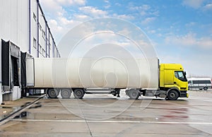 Cargo truck at warehouse building