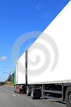 Cargo Truck with White Trailers on Motorway
