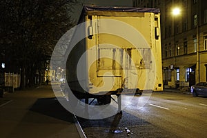 Cargo van parked on evening street