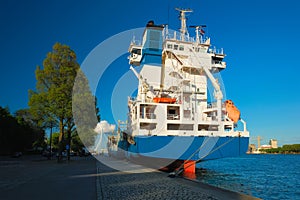 Cargo vessel moored to the quay of Nieuwe Maas river in Rotterdam