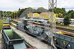 Cargo wagons stopped at a station