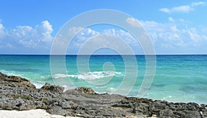 Caribbean beach background with lava rocks