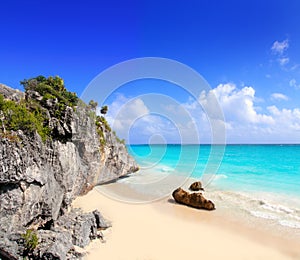 Caribbean beach in Tulum Mexico under Mayan ruins photo