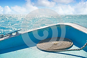 Caribbean boat bow with spiral rope sailing