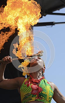 Caribbean Joy Dancer blowing fire