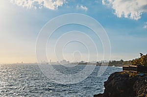 Caribbean sea view of Santo Domingo as golden tropical sunset