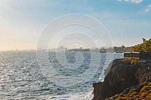 Caribbean sea view of Santo Domingo as golden tropical sunset