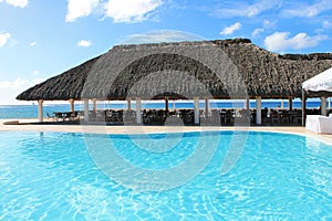 Caribbean Spa Hotel Pool and Ocean Landscape Background
