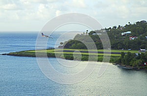 The Caribs.The plane lands at the airport of the island of St. Lucia.