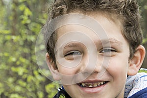 Caries of the boy's teeth. photo