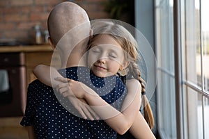 Caring daughter hugging ill mother believing in good therapy result