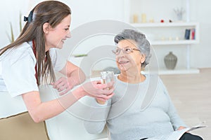 Caring nurse supporting patient