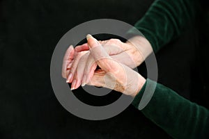 Caring older woman hands