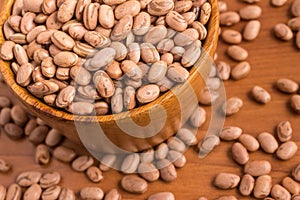 Carioca Beans into a bowl photo