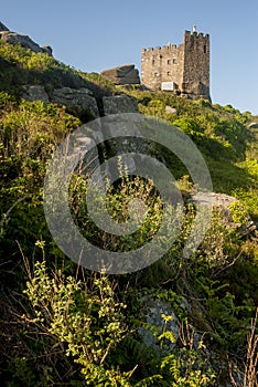 Carn brea hill covered in the afternoon sun