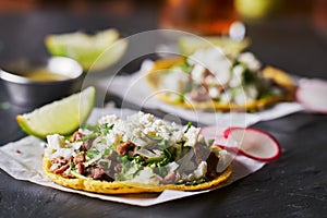 Carne asada mexican tacos with crumbled queso fresco cheese