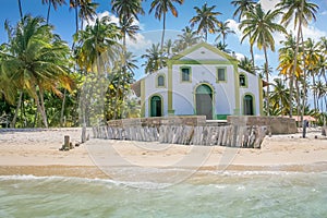 Carneiros idyllic beach with Chapel church at sunny day, in Northeastern Brazil