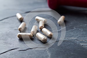 Carnitine capsules. Concept for a healthy dietary supplementation.