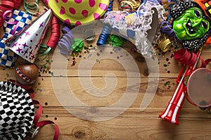 Carnival background on a wooden surface.